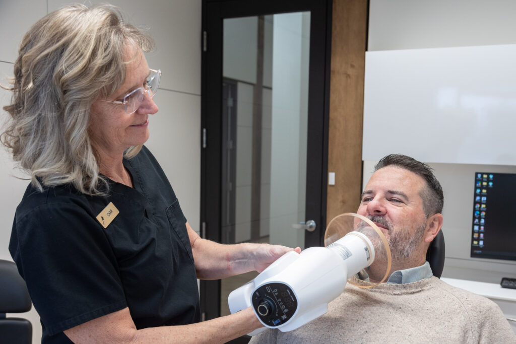 Char a dental hygienist at Spokane Valley Dentistry giving a patient x-rays